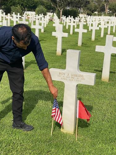 This groundskeeper had the utmost respect and careful attention to every detail in maintaining the graves. When I asked him how long he had been doing this work, he said, for 25 years - and that it had become his life's work.