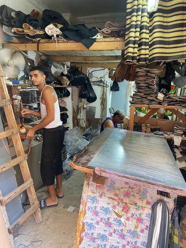 A shoemaker in the Casbah in his generations old family business.