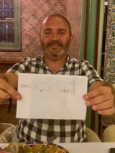 Our guide, Monaam, wrote all of our names in Carthaginian script.