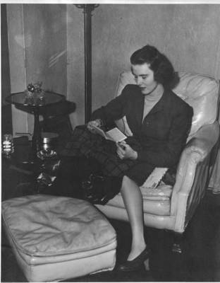Jean Hoyer Ludwick, reading one of the hundreds of letters sent to her by her husband, medical officer Lt. Col./Maj. Arthur L. Ludwick, Jr. M.D., from the frontlines of WWII. After being married only two months, Jean and Lud were separated for over 28 months.