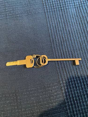 The keys to my hotel room and the hotel’s massive double wooden front doors.