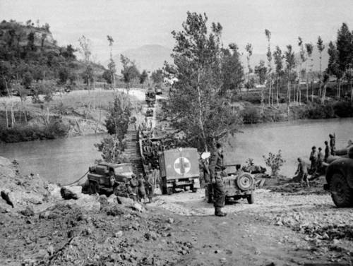 Since the Germans had blown all the bridges, the 34th had to build pontoon bridges to get their vehicles across. The Germans were in the hills, firing down on them.