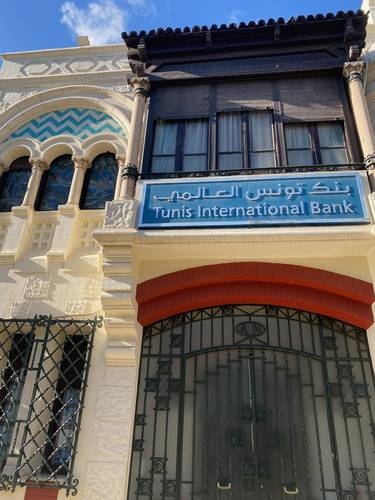 Signage in Arabic and English.