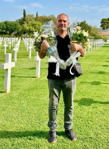 Our wonderful guide, Monaam Triki, was instrumental in facilitating the purchase of flowers for the two graves we visited.