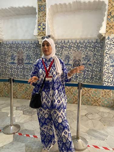 At the Rais Palace in Algiers. I love this photo of Luna in front of the blue Delft (from The Netherlands) tiles. Tunisian tiles are below, in traditional yellow and green colors. The wealth of a particular ruler was often measured by how many different tiles from different countries were on display in his palace/residence.
